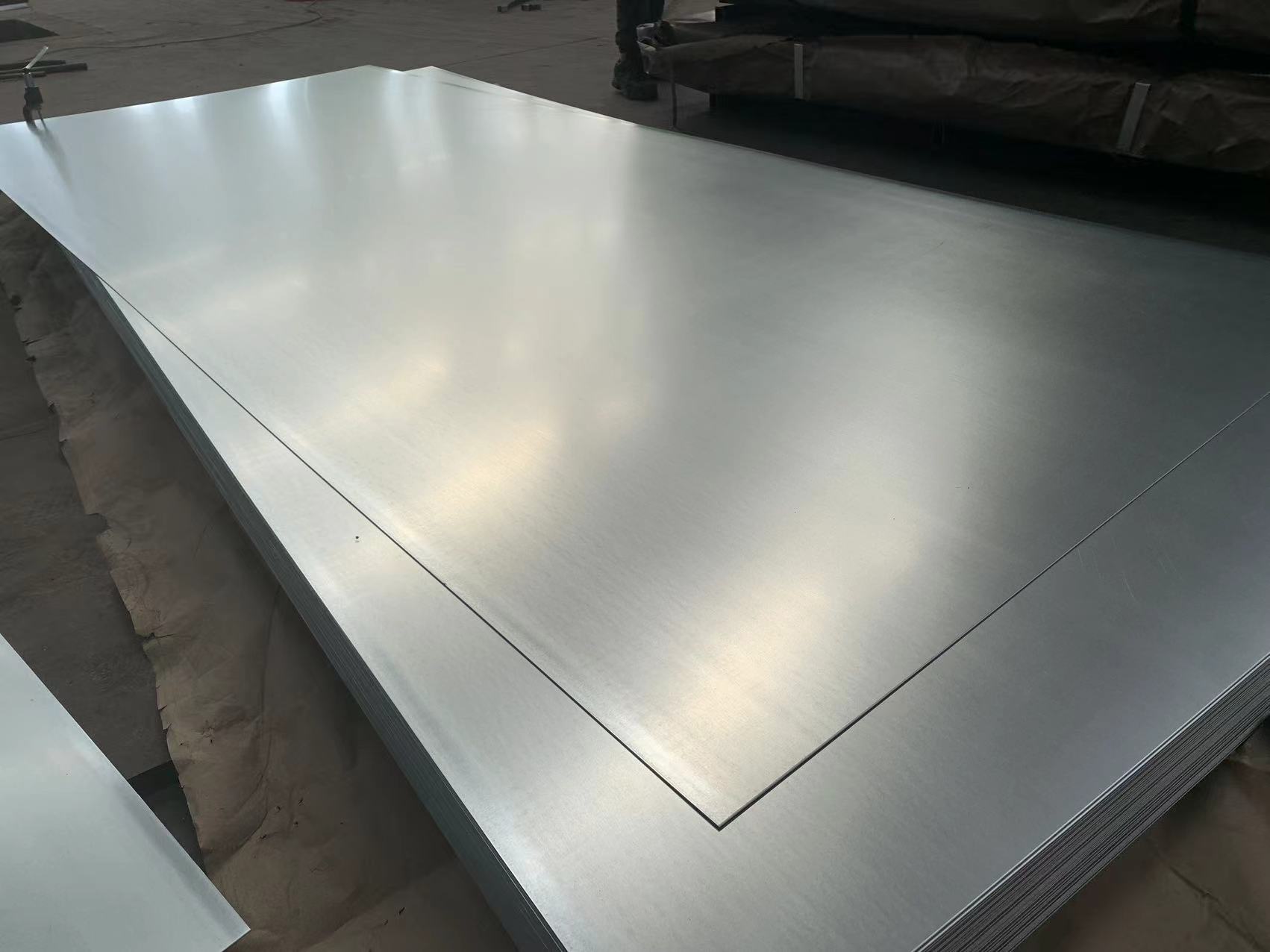 The zinc coating on galvanized sheet metal acts as a sacrificial layer, ensuring that water and moisture do not come into direct contact with the steel underneath.